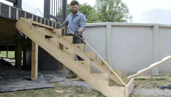 Image Person Installing Deck Stairs