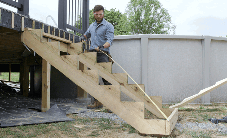 Image Person Installing Deck Stairs