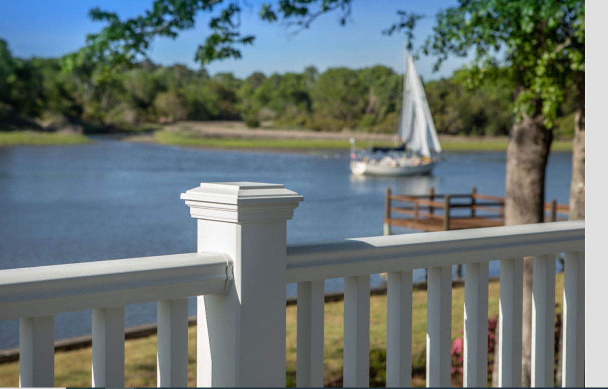 Deck Railing With Lake In The Background