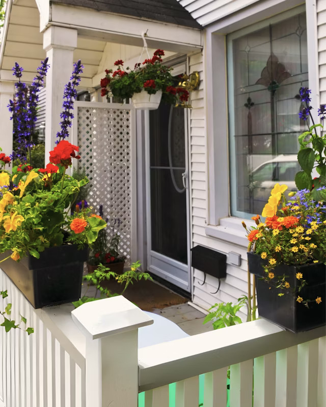Planter Boxes On The Porch Rail