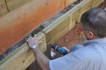 Use a 1/2" diameter 12" long bit to drill thru holes for your thrubolts.