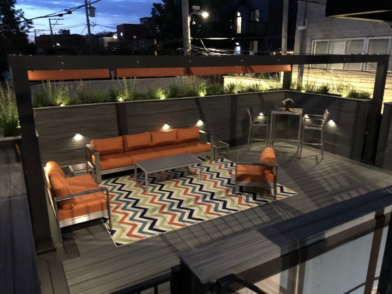 Trn Urbandeck Fascia Cs Lighting Pergola Rug Planter Night Sitting Area