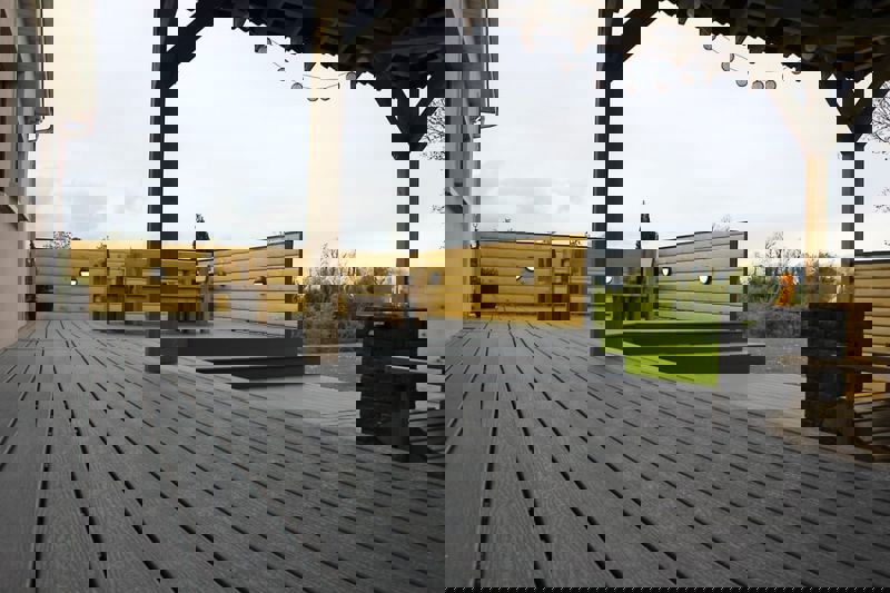 High standing pergola covering a fire pit